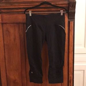 Athleta crop leggings with reflective pieces